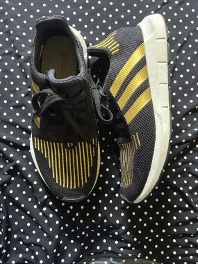 Men’s size 8.5 Black and Gold Adidas Athletic Shoes